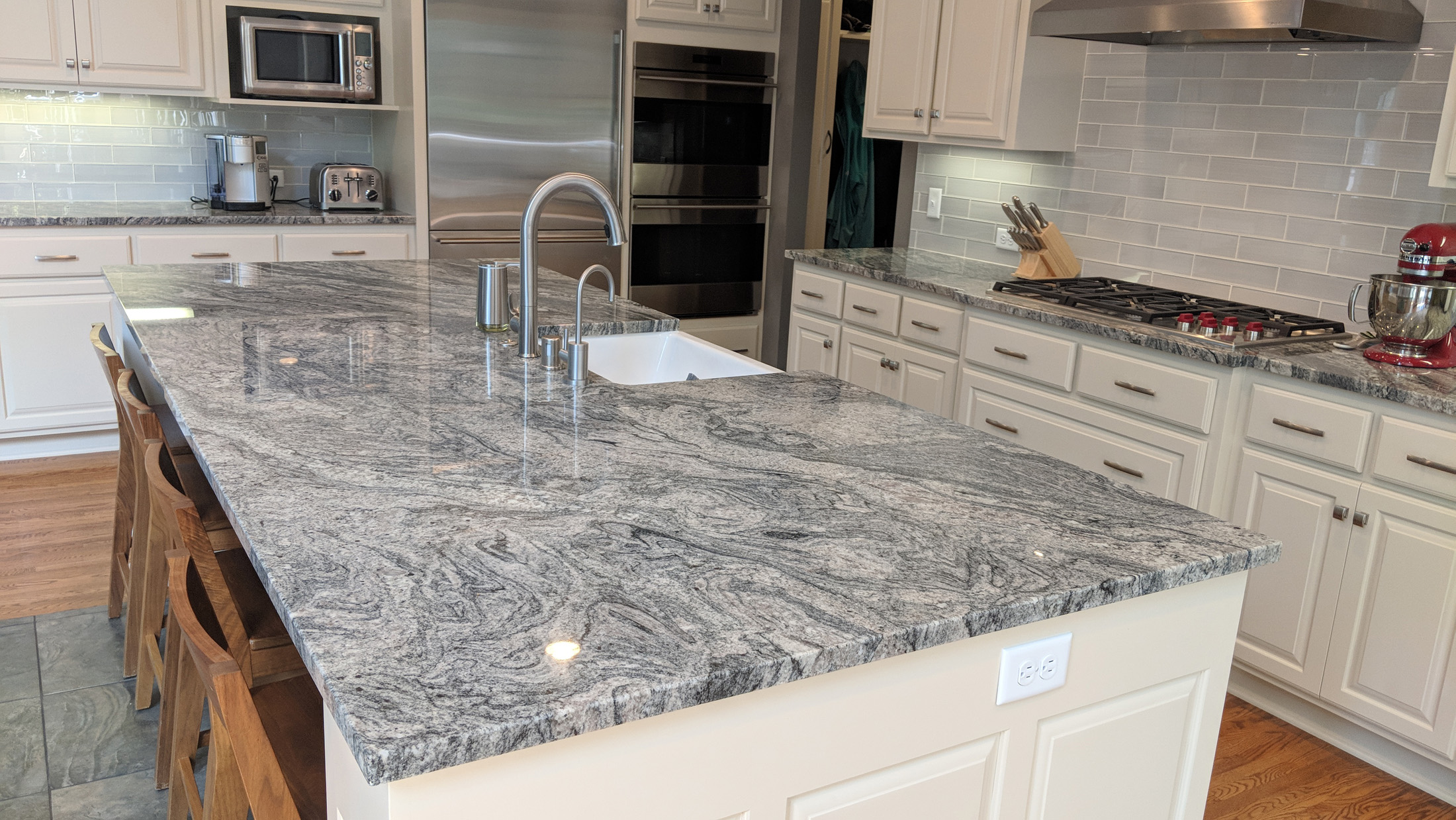 After - New Granite tops & enameled island cabinets