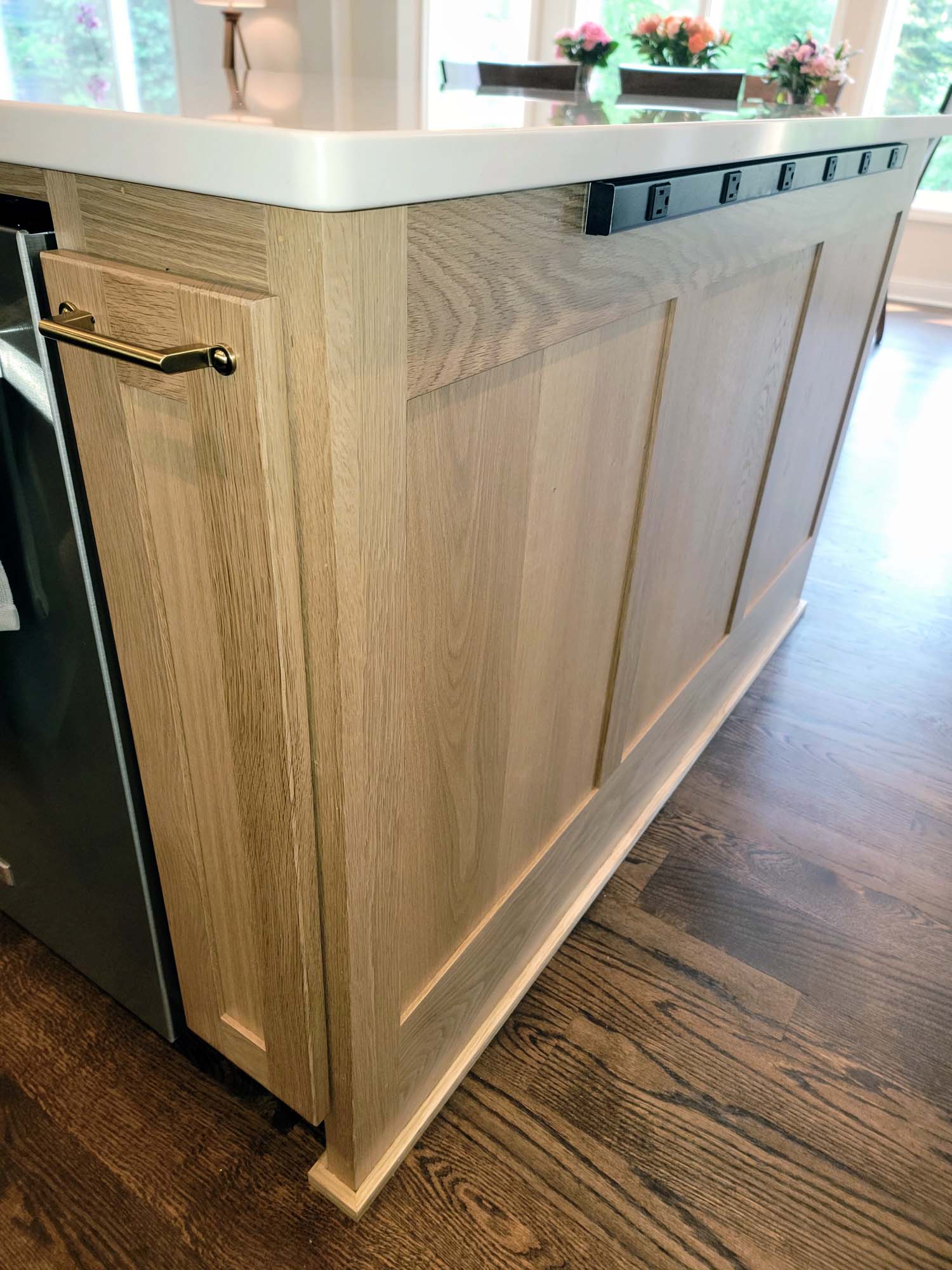 Kitchen island shaker style end panels with strip of outlets