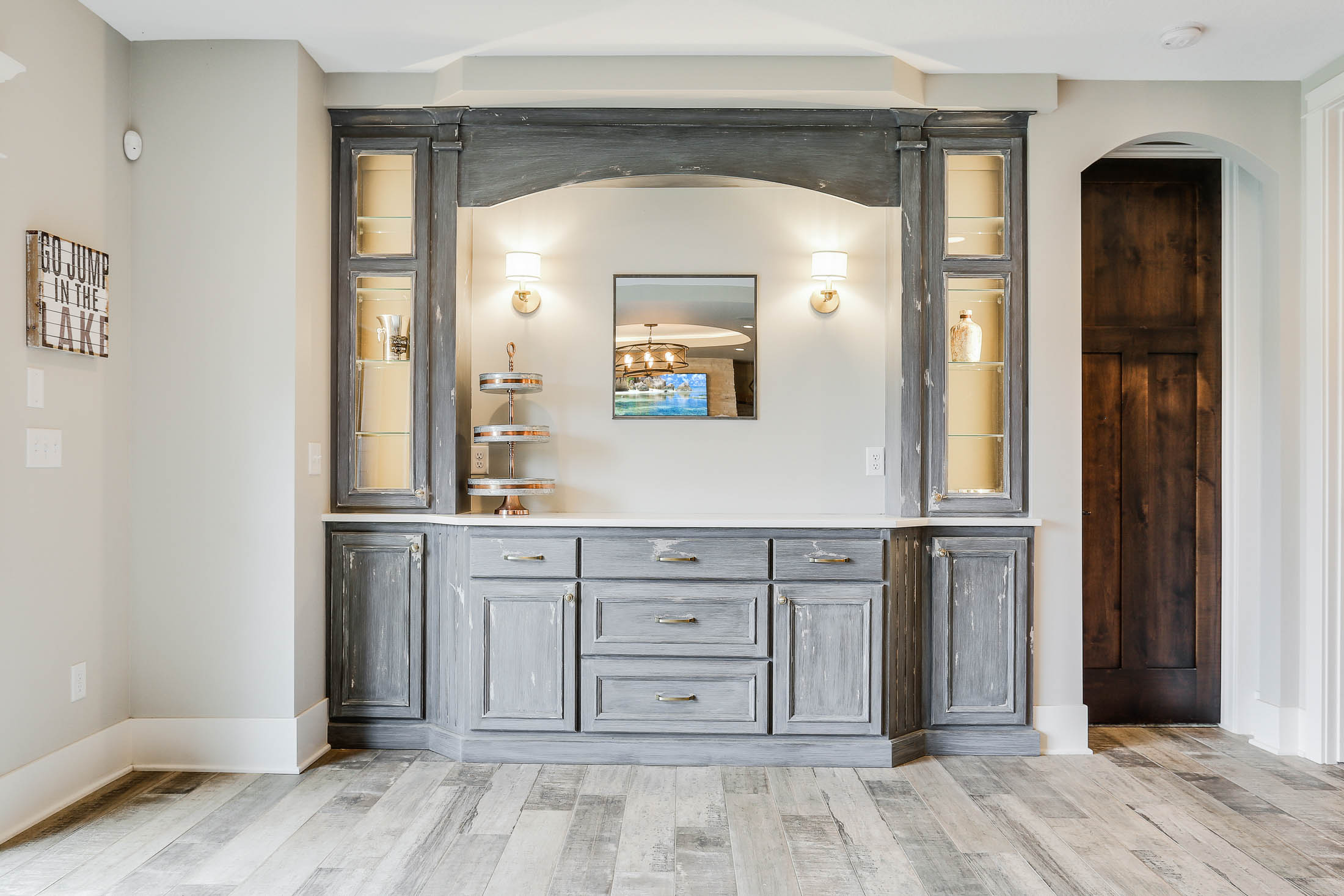 Built-in buffet with distressed enameled cabinets