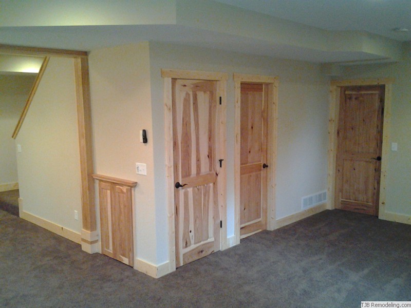 Knotty Pine Walls and Custom Hickory Raised Panel Doors