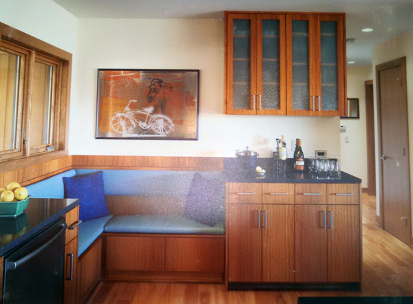 Kitchen cabinets are frameless African mahogany